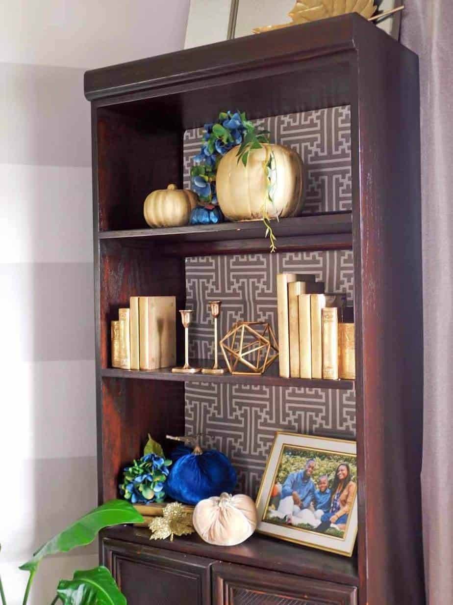 Full bookcase with DIY Pumpkin Vases